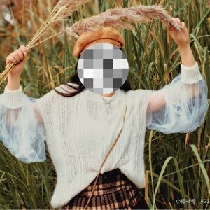 Elegant White Sweater with Sheer Sleeves